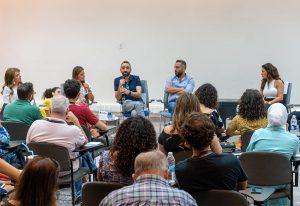 group of filmmakers discussing refugee crisis